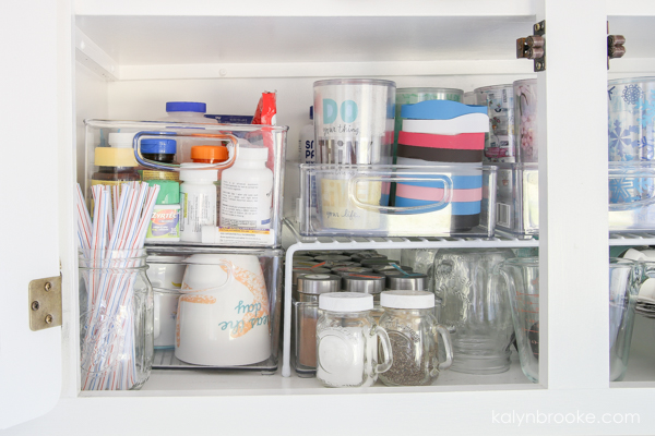 stacking shelves in a cabinet
