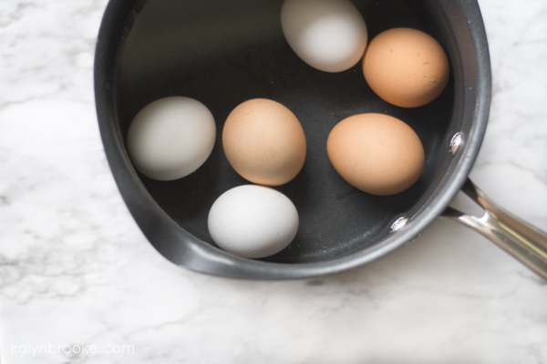 Boiled eggs in pot