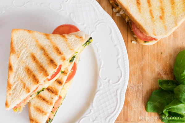 Need a go-to healthy lunch? This cheesy tomato basil sandwich comes together in minutes and is a lighter alternative to a heavy meal. Grilled to perfection, you will love every gooey, flaky, and savory bite!